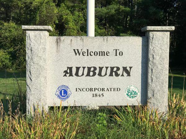 White granite stone Welcome to Auburn New Hampshire